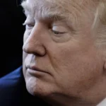 President Donald Trump looks on during a National Economic Council meeting in the Oval Office at the White House March 24, 2017 in Washington, DC.